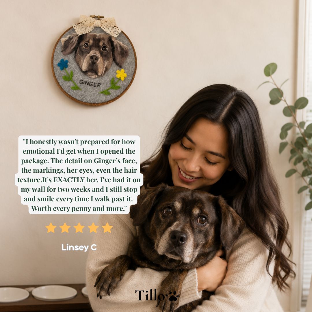 A woman in a cream sweater holds a dark brown dog in a cozy indoor setting, with a circular pet portrait hanging on the wall above them. A review text box on the left reads, 'I honestly wasn't prepared for how emotional I'd get when I opened the package.
